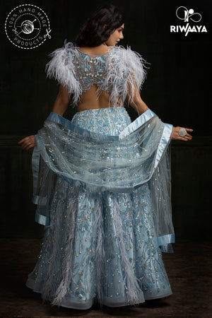 blue lehnga with feathers 