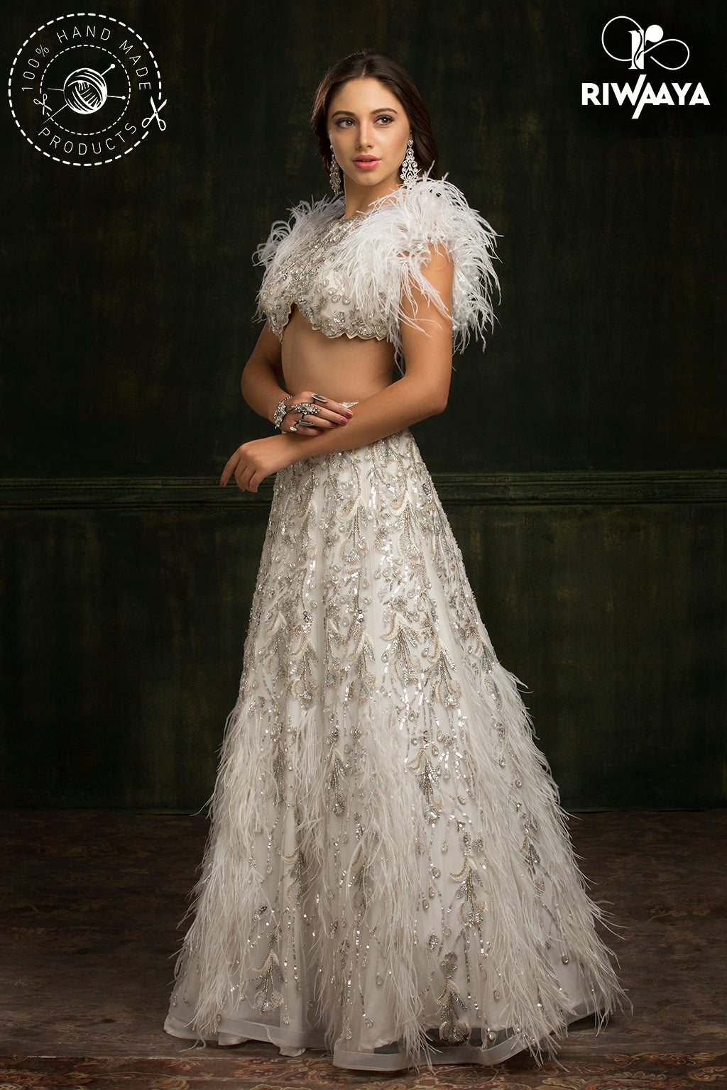 white lehnga with feathers